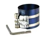 A piston ring compressor tool and an L-shaped hex wrench are displayed against a white background. Náhled obrázku produktu