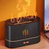 A black humidifier with a flame effect is placed on a wooden desk next to a laptop. Voir les images du produit