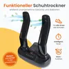 A black shoe dryer with two nozzles, placed on a stand with buttons and a digital display. The background is split between white and a gradient of light yellow to orange. Green leaf graphics and blue wavy lines suggest air circulation and freshness. Produktbild-Vorschau