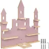 A pink castle-shaped wall shelf with wooden shelves. Náhled obrázku produktu