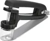 A black cherry pitter with a clear collection cup. Anteprima dell’immagine prodotto