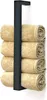 A black metal towel rack holding four rolled beige towels, mounted on a white wall. Anteprima dell’immagine prodotto