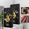 A collage of images showing a phone case with a butterfly design, a person working with leather, and samples of leather materials. Produktbild-Vorschau