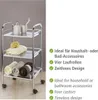 A chrome-plated rolling cart with three shelves, holding towels and bathroom accessories, next to a list of features. Náhled obrázku produktu