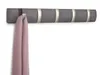 A wall-mounted coat rack with a scarf hanging on one of the hooks. Anteprima dell’immagine prodotto