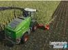 A green Fendt combine harvester is harvesting a cornfield. Náhled obrázku produktu