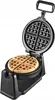 An open waffle maker with four waffles inside. Podgląd zdjęcia produktu