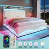 A modern bedroom setting with a white LED bed. Náhled obrázku produktu