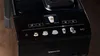 Close-up of a black Siemens coffee machine with a digital display showing drink options. Náhled obrázku produktu
