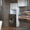 A modern bathroom with a washing machine and storage cabinets. Produktbild-Vorschau