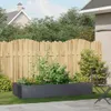 A raised garden bed filled with plants in a backyard setting. Anteprima dell’immagine prodotto