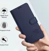 A hand holds a blue flip phone case with a cat design, with feature icons on the left. Produktbild-Vorschau