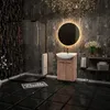A modern bathroom with a vanity, sink, mirror, and shower. Podgląd zdjęcia produktu