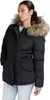 A woman wearing a black winter jacket with a fur-lined hood. Produktbild-Vorschau