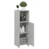 A tall, narrow cabinet with a concrete gray finish, shown against a white background. The cabinet has two shelves and a door that is slightly ajar. Decorative items and towels are visible inside. Náhled obrázku produktu