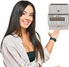 A woman is presenting an energy meter. Produktbild-Vorschau
