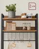 A rustic wood and metal shelving unit holding various kitchen items including jars of food, coffee bags, mugs, and a plant. Náhled obrázku produktu