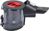 A close-up of a vacuum cleaner dustbin and hose attachment. Voir les images du produit
