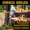 A hand holding a spray can in front of a barbecue with food on the grill. Produktbild-Vorschau