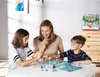 A family playing a board game. Produktbild-Vorschau