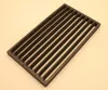 A dark gray cast iron grate with parallel slats is shown from a slightly elevated angle. Produktbild-Vorschau