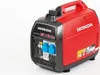 A red and black Honda EU22i inverter generator is shown against a white background. Produktbild-Vorschau