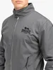 Close-up shot of a man wearing a gray bomber jacket. Anteprima dell’immagine prodotto