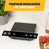 An induction cooktop with an illuminated touch control panel, placed on a kitchen counter next to a potted plant and some ingredients. Voir les images du produit