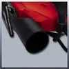 Close-up of a red power tool with a black nozzle and cord. Produktbild-Vorschau
