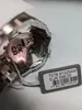 A close-up view of the back of a Swiss Alpine Military watch, showing the model number and price tag. Voir les images du produit