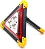 A triangular LED warning light with a stand. Voir les images du produit