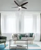 A living room with a ceiling fan and furniture. Produktbild-Vorschau