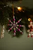 Christmas ornaments on a tree branch. Produktbild-Vorschau