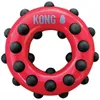 A red circular dog toy with black dots is shown against a white background. Produktbild-Vorschau