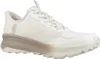 A side view of a white and tan Skechers slip-on sneaker. Produktbild-Vorschau