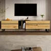 A TV stand with a TV mounted above it, in a living room setting. Anteprima dell’immagine prodotto