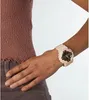 A person's arm wearing a pink Casio G-Shock watch. Produktbild-Vorschau