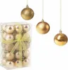 A box of gold Christmas ornaments and three individual gold Christmas ornaments hanging. Anteprima dell’immagine prodotto