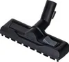 A black vacuum cleaner floor nozzle with a switch is shown against a white background. Anteprima dell’immagine prodotto