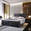 A luxurious bedroom with a large bed as the focal point. Produktbild-Vorschau