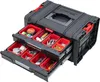 A black and red tool chest with multiple drawers filled with various tools and hardware, displayed against a white background. Náhľad obrázku produktu