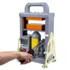 A hand is shown operating a rosin press machine. Produktbild-Vorschau
