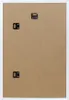 The back of a white picture frame with two metal hanging hooks. Produktbild-Vorschau