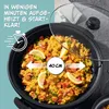 A top-down view of an electric pizza pan filled with paella, with a glass lid partially open. Anteprima dell’immagine prodotto