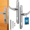 A set of door handles and related hardware, with one handle attached to a wooden door. Náhľad obrázku produktu