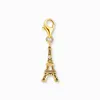 A gold-colored Eiffel Tower charm with a small diamond accent, attached to a lobster clasp. Produktbild-Vorschau
