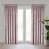 Two pink curtains are hung on a window rod in front of a window. A potted plant is visible to the right of the curtains. Podgląd zdjęcia produktu