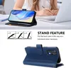 A person is using a phone with a blue case on a desk with a laptop. Produktbild-Vorschau
