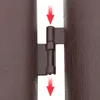 Close-up of a brown fence hinge with red arrows indicating downward movement. Náhled obrázku produktu