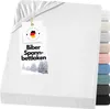 A white fitted sheet with a tag attached.
